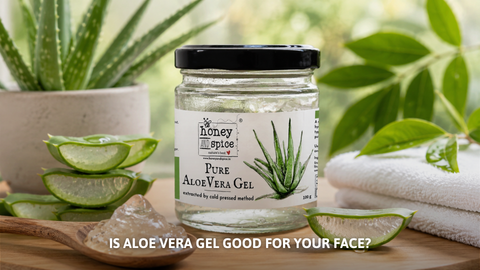 Honey and Spice pure aloe vera gel jar next to fresh aloe leaves.