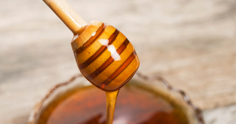 What could be the reason that we use a spoon to measure most of the things, but not to honey ?