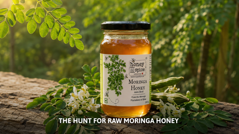 Jar of Honey and Spice Raw Moringa Honey in a blooming mustard field with drumstick flowers in Bihar.