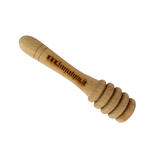 Close-up of a wooden honey dipper showcasing its smooth finish and ergonomic design.