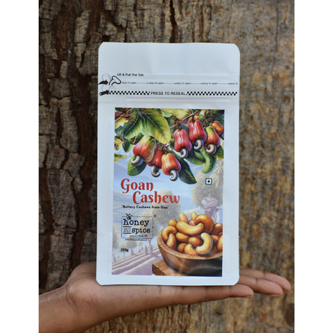 Goan Cashew 250g pack  Buttery cashews from Goa held in hand outdoor.