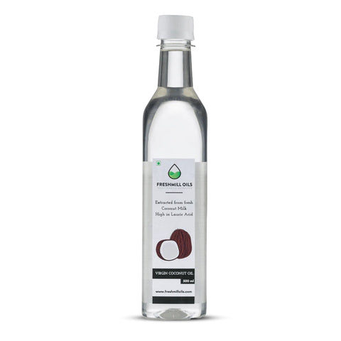 Side angle of Virgin Coconut Oil showing front label and product branding