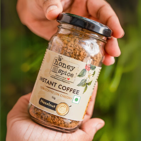 Hazelnut Instant Coffee jar 50g in hand