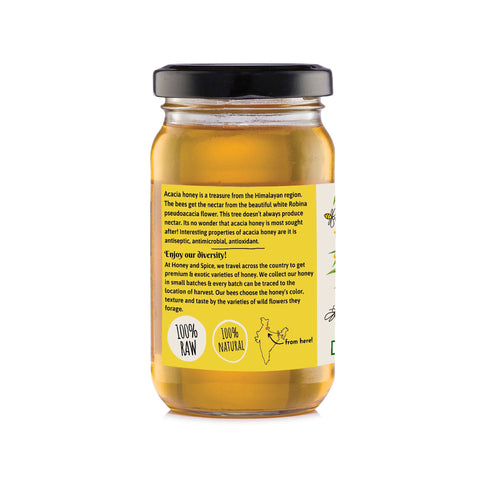 Back label of Wild Acacia Honey jar – product details and purity assurance