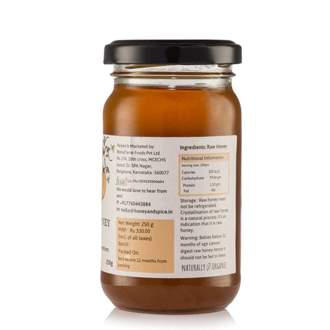 Side label view of Rosewood Honey jar with ingredients and info