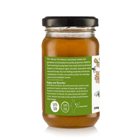 Back view of Buckwheat Honey jar, showcasing the product's story and benefits on a green label.