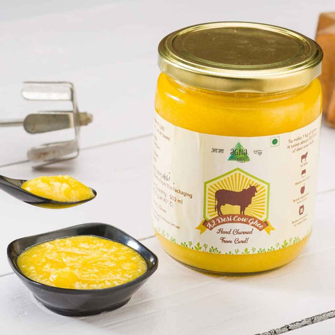 Desi Cow Ghee in golden texture – Served in bowls on white tabletop background.