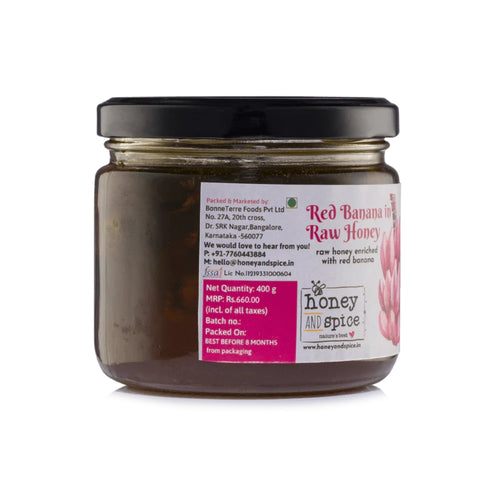 Side view of Red Banana in Raw Honey jar, highlighting premium ingredients and nutritional details.