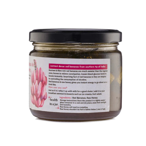 Back view of Red Banana in Raw Honey jar, showcasing product information and natural origins.