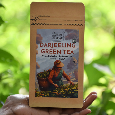 Darjeeling Green Tea pouch held in hand – 30g