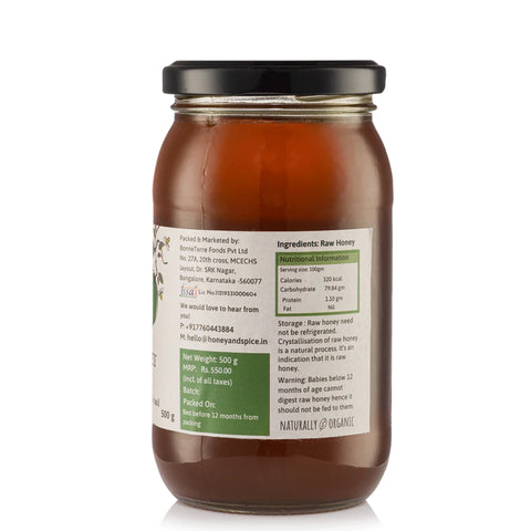 Side view of Tulsi Honey jar displaying ingredients and nutritional information