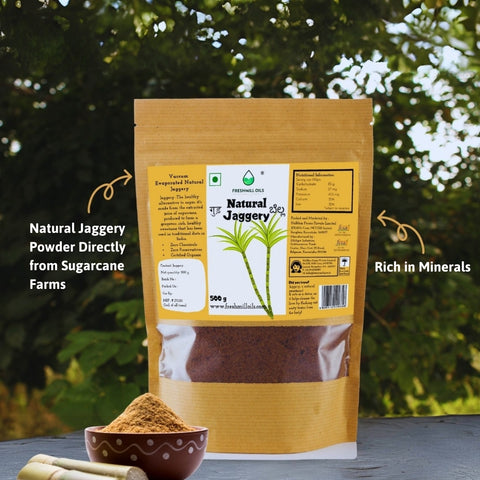 Natural Jaggery Powder displayed outdoors with raw jaggery block – pure and natural ingredients