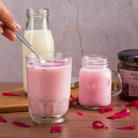 Honey Rose Gulkand mixed in milk – delicious wellness drink idea with rose, nuts, and honey