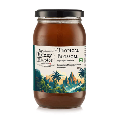 Front-facing Tropical Blossom honey jar with illustrated tropical forest label