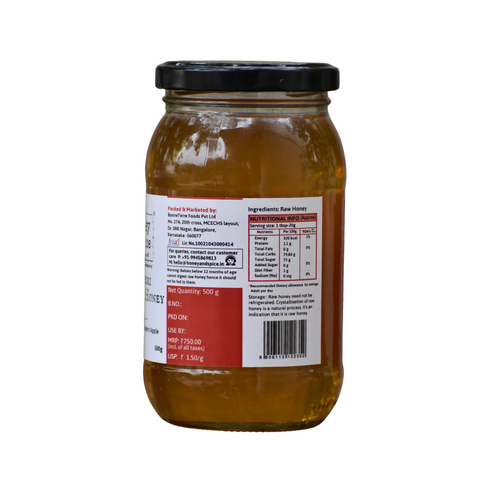 Back view of Kashmiri Apple Honey jar 500g. displaying nutritional info, ingredients, manufacturing details, and barcode.