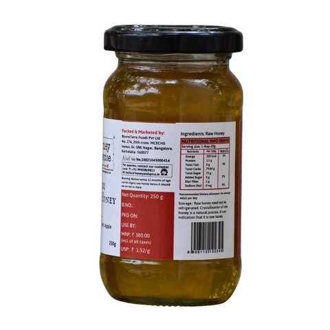 Back view of Kashmiri Apple Honey jar 250g. displaying nutritional info, ingredients, manufacturing details, and barcode.