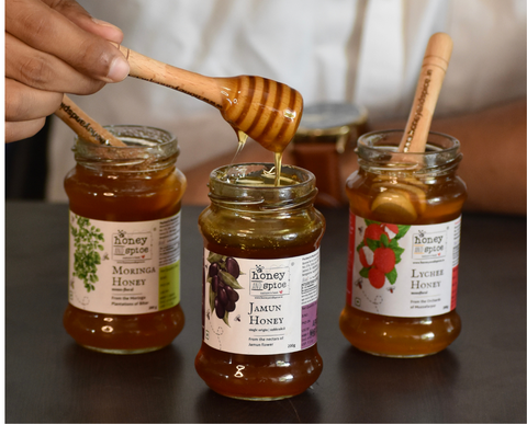 Pouring raw honey from Honey jars – perfect for gifting or daily use with natural goodness