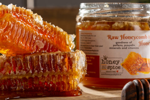 Close-up of Honey & Spice Raw Honeycomb in Honey - fresh, golden honeycomb chunks packed with flavor.