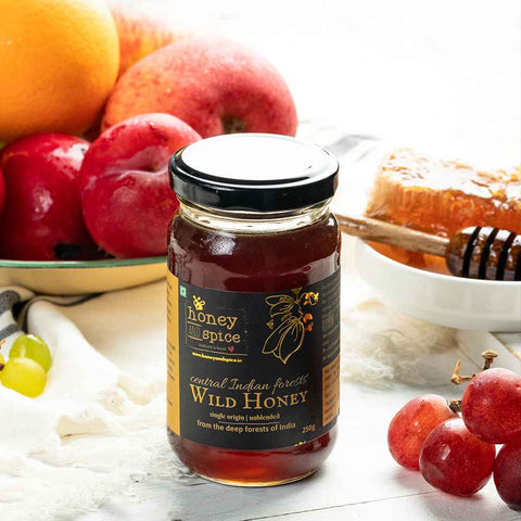 Wild Honey jar with with fresh fruits