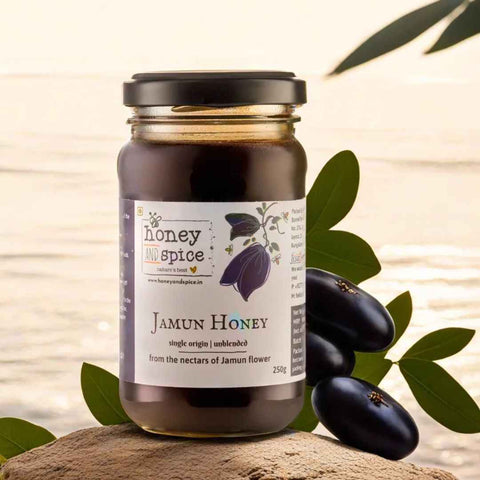 Jamun Honey jar 250g with fresh jamun fruits placed in natural lake view
