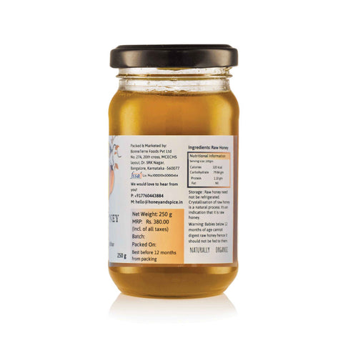 Side view of Moringa Honey jar showing nutritional details and branding
