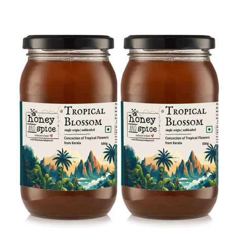 Two Tropical Blossom honey jars side-by-side showing product branding