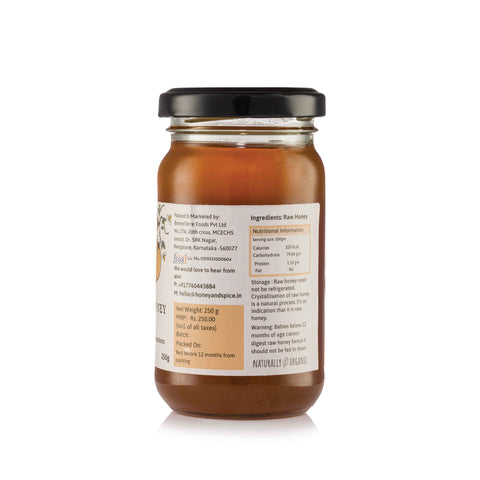 Side view of Rosewood Honey jar with detailed label and nutritional info