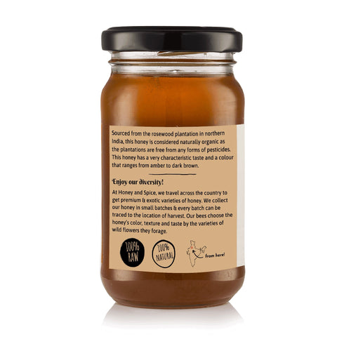 Back label of Rosewood Honey jar with product story and brand certifications