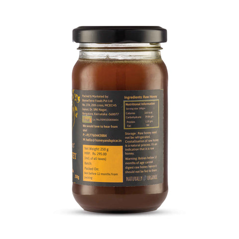 Side label of Wild Honey jar with sourcing and ingredient details