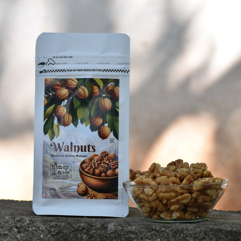 Kashmiri Walnuts pouch and glass bowl of kernels.