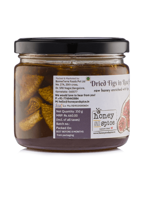 Side view of Dried Figs in raw honey jar 350g