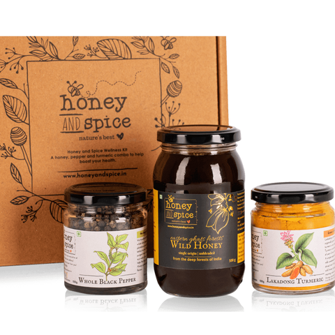 Gift set featuring wild honey, whole black pepper, and luscious turmeric jars with elegant packaging.