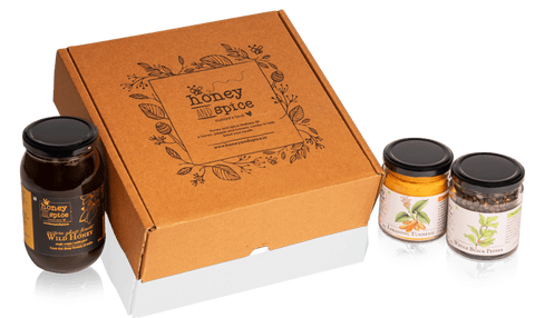 Gift box with labeled packaging for natural and organic products.