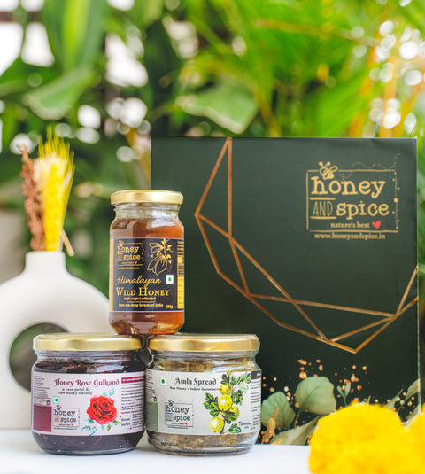 Gift box with jars of Wild Honey, Honey Rose Gulkand, and Amla Spread, ideal for gifting