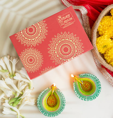 Gift box with marigolds and diyas