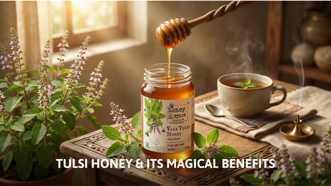 Honey and Spice Vana Tulsi Honey jar on a wooden table with fresh Holy Basil leaves.